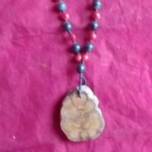 Shaman amulet necklace natural seeds Amazon jungle